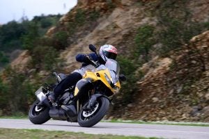 Nic heels the Triumph Tiger Sport 800 over, on a mixed-weather launch in Portugal. Photo: Triumph