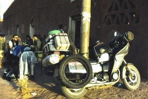 Our laden bike somewhere in the Sahara at a cafe.