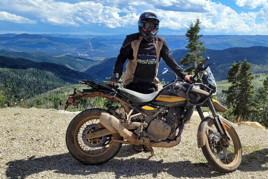 At the end of the day's dirt road sections, minus a mirror! Photo: Will Roberson